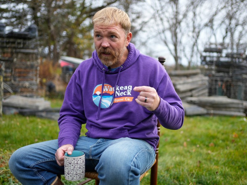 Graham Platner, Democratic candidate for U.S. Senate, speaks to a reporter at his home, Monday, Nov. 3, 2025, in Sullivan, Maine.