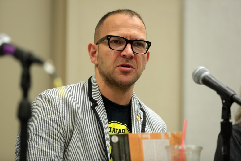 Enshittification Age: Cory Doctorow speaking at the 2018 Phoenix Comic Fest at the Phoenix Convention Center in Phoenix, Arizona.