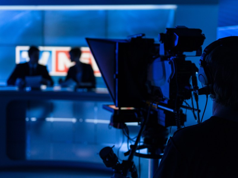 Newsreaders In Television Studio